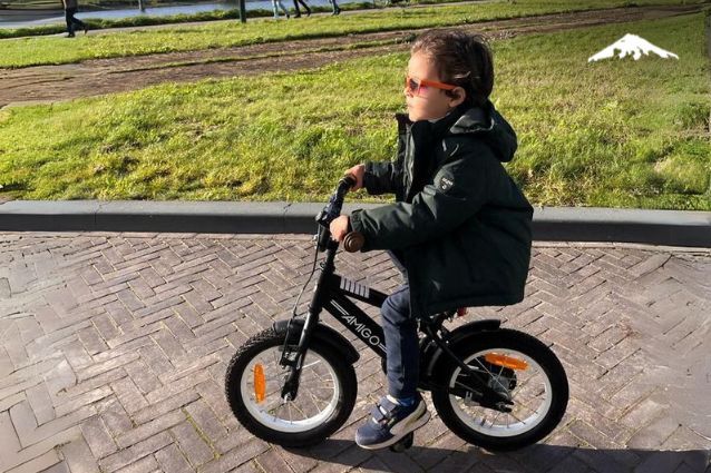 Miguel riding bike across Denmark.