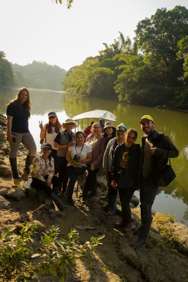 group of travelers in a river expedition around the ecuador amazon forest.