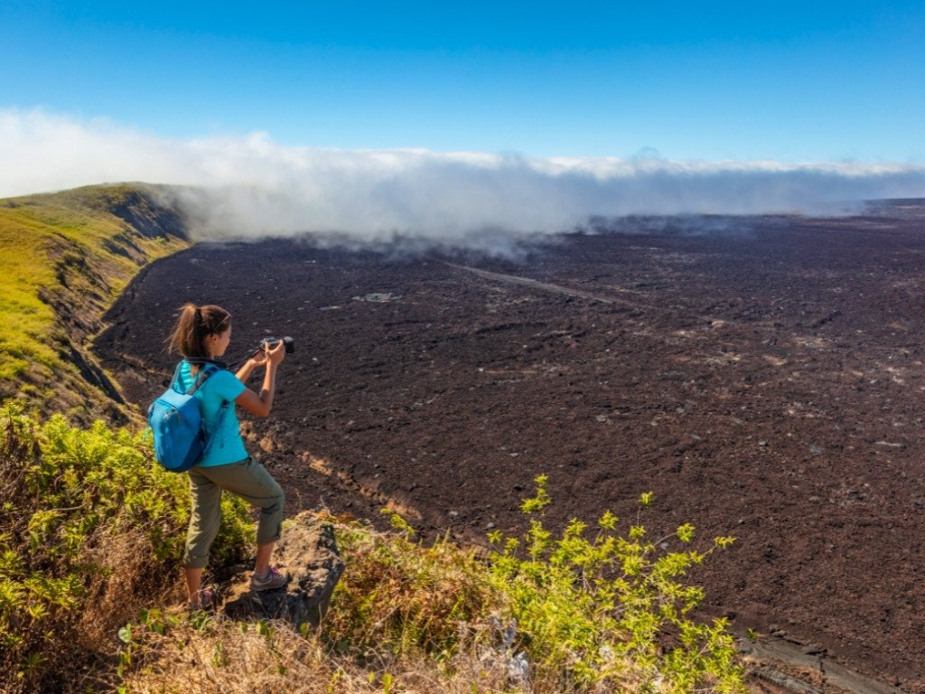 hikers on the sierra negra volcano trail, isabela island galapagos