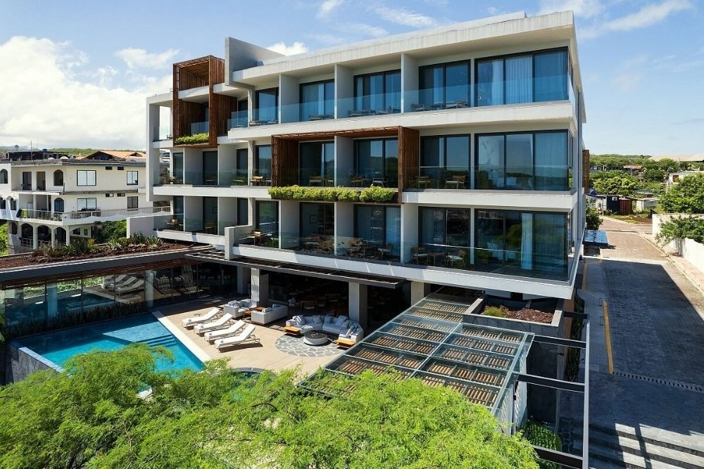 hotel indigo on san cristobal island with modern design and pool highlighting galapagos luxury hotels.
