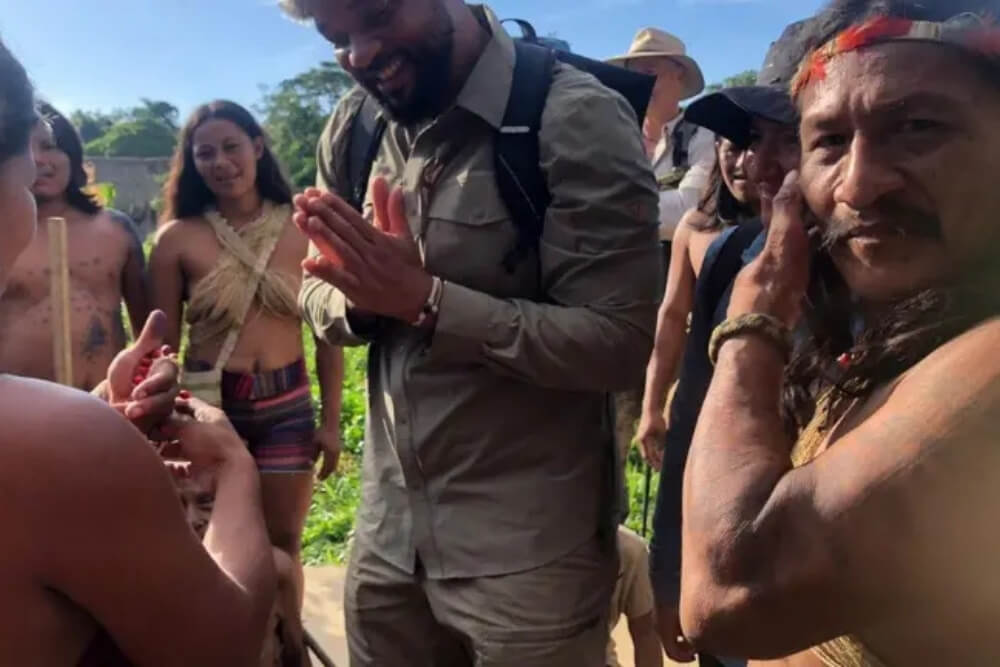 penti baihua welcoming will smith during a traditional ceremony with the waorani community in the ecuadorian amazon