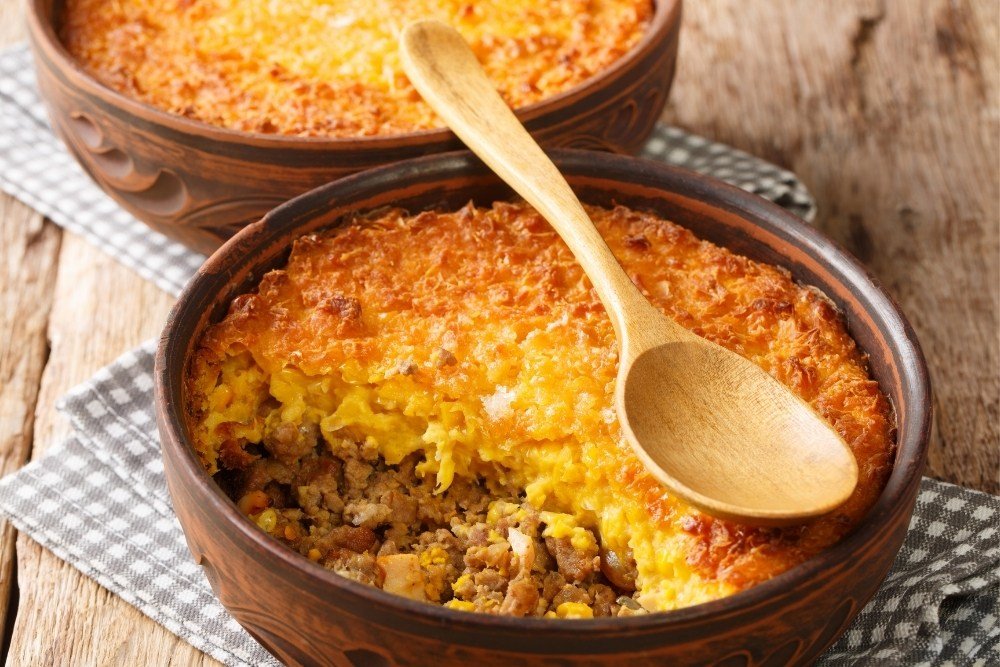 corn pie made in a cacerole filled with meat