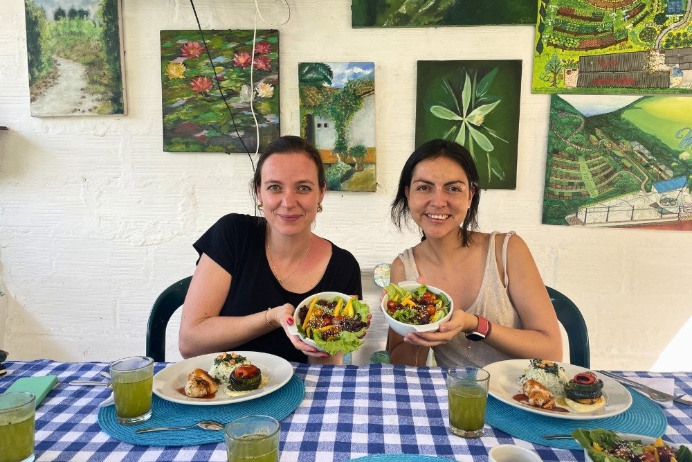 rebecca and martita showing the result of the cooking class part of the colombia tours