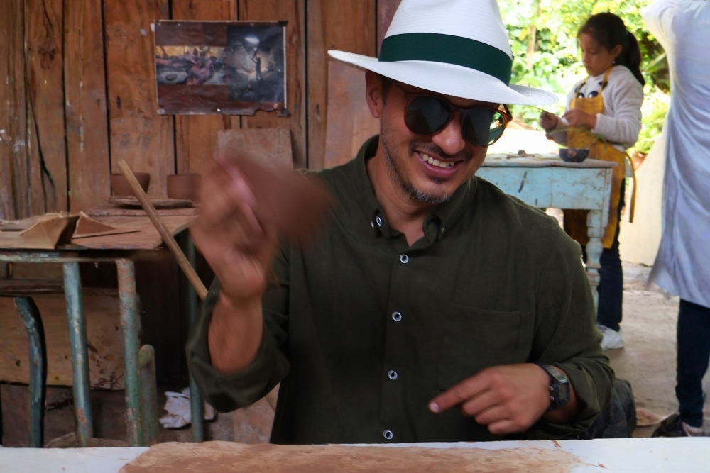 juan carlos flores attending a pottery workshop in costa rica