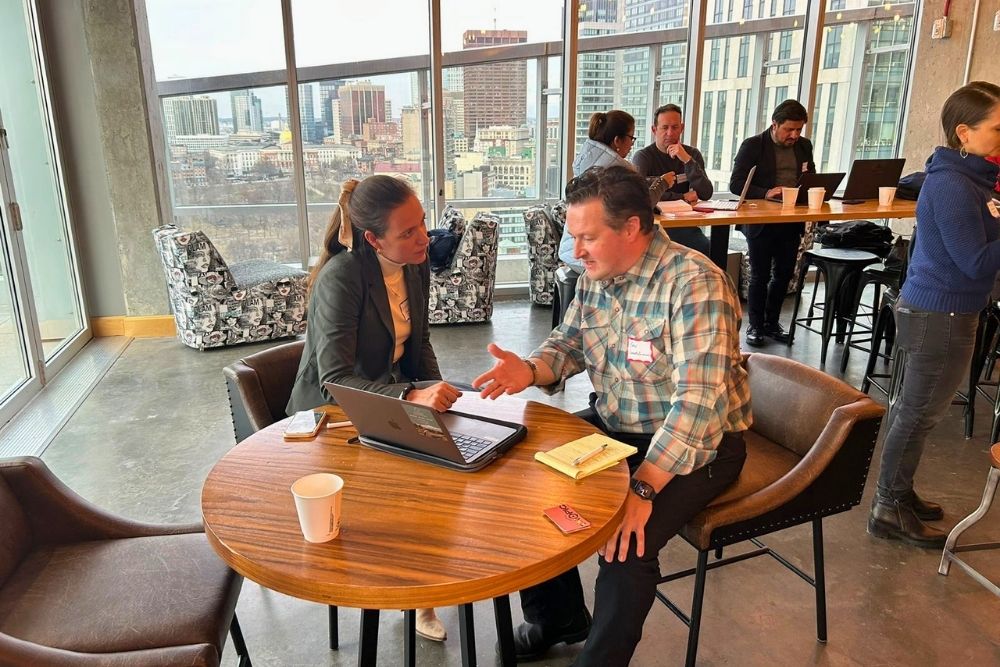 rebecca braak, rat's ceo, in a b2b service meeting with a european tour buyer